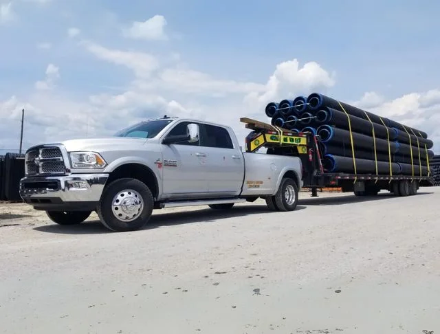hotshot truck loaded with pipes